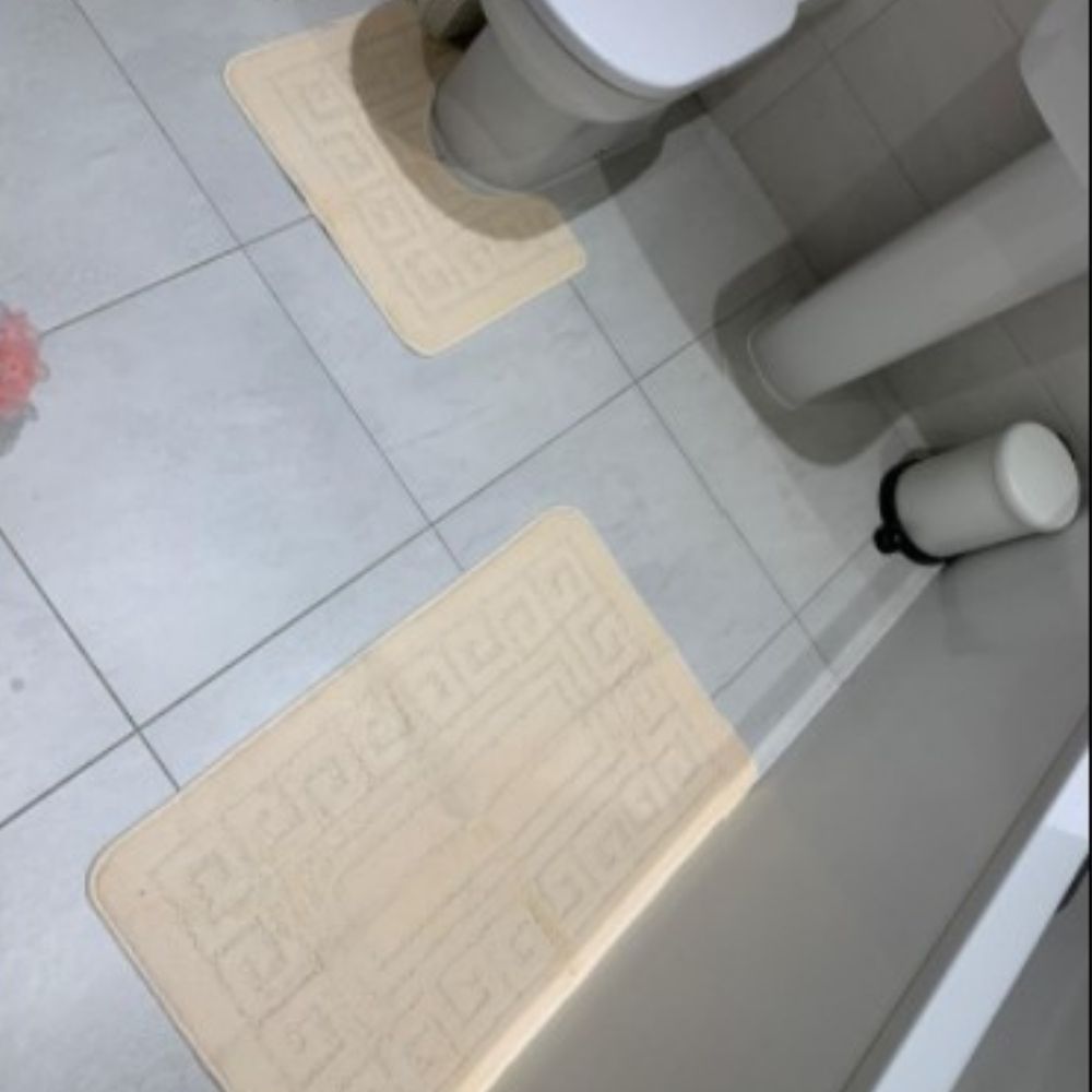 A two piece microfibre bath mat set in mocha
